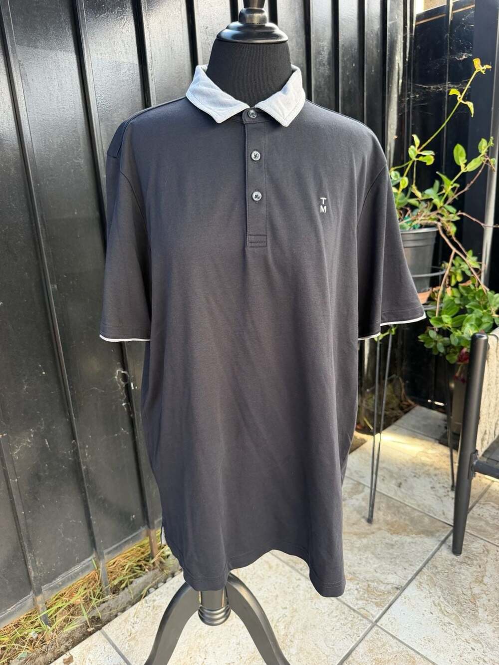 TravisMathew Men's Black Polo Shirt with Grey Collar and TM Logo